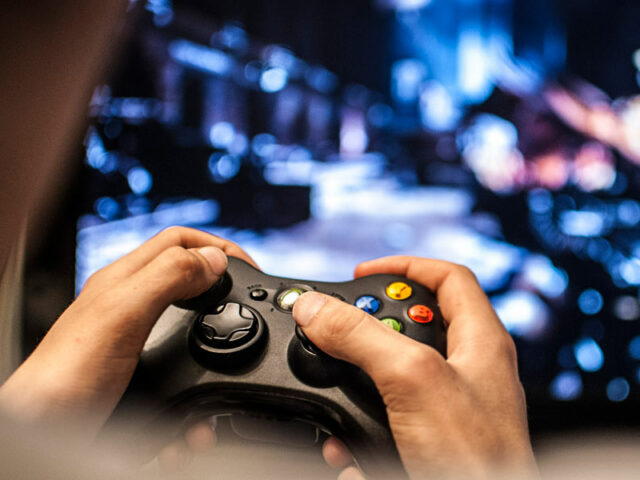 Playing-Game-Xbox-Controller